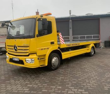 Żółta autolaweta samochodowa Mercedes – Pomoc Drogowa w Makowie Mazowieckim, Ciechanowie, Ostrołęce Żółta autolaweta samochodowa Mercedes.